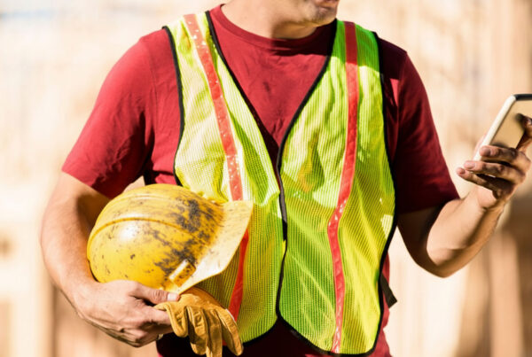 Union Worker Checking Communications