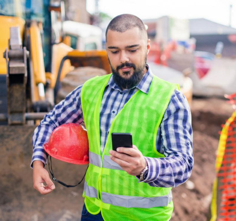 construction worker on phone